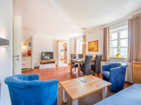 Feriendorf Rugana - Komfortplus Ferienwohnung mit 1 Schlafzimmern und Terrasse A21